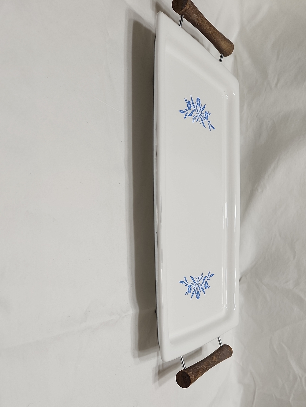 White Ceramic Serving Tray with Blue Floral Accents and Wood Handles